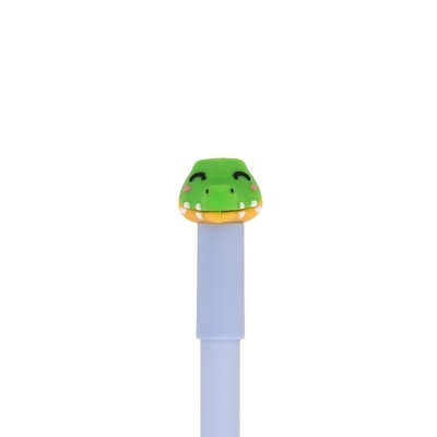 Caneta branca com tampa verde em forma de cabeça de crocodilo sorridente
