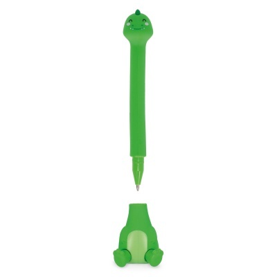 Caneta verde em forma de dinossauro com cabeça sorridente e tampa com patas.