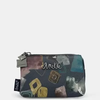 Carteira pequena colorida com padrão abstrato e fecho de zíper