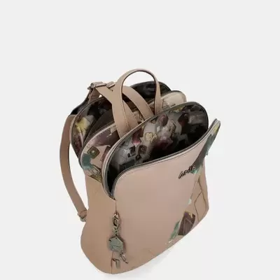 Mochila feminina bege com interior floral e fecho aberto