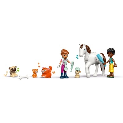 Brinquedos LEGO figuras humanas, cavalo branco, três cães, dois gatos e acessórios médios