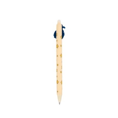 Caneta creme com estrelas amarelas e clip azul