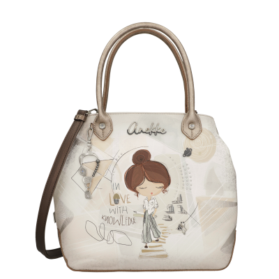 mala saco creme com ilustração de rapariga e texto In Love With Knowledge