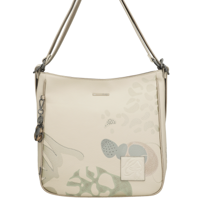 Mala de ombro creme com padrão abstrato e pendente decorativo