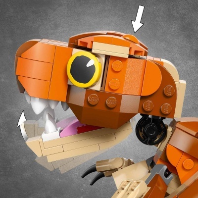 Miniatura de dinossauro T-Rex de Lego laranja em fundo cinza