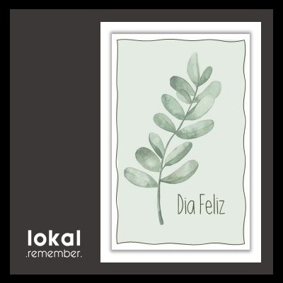 Cartão com ramo de folhas verdes e texto Dia Feliz