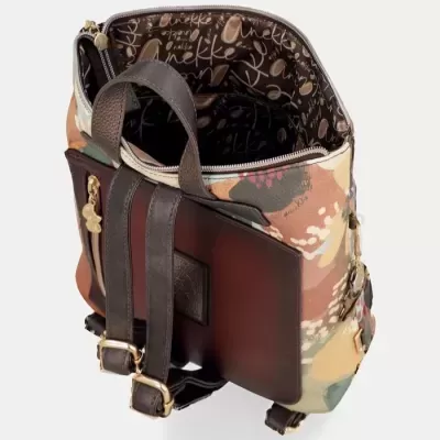 mochila colorida com padrão, alças e interior com texto Anekke