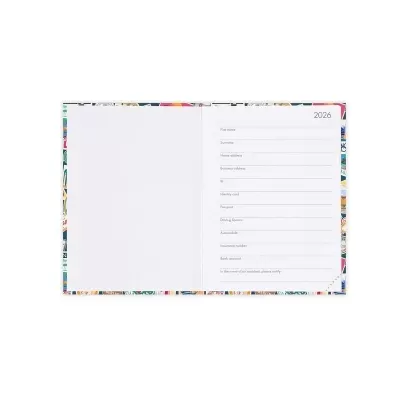 Agenda aberta com capa colorida e páginas internas com formulário