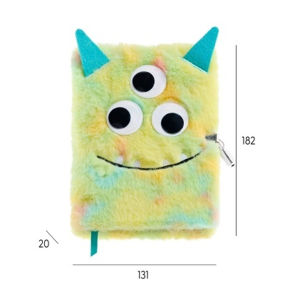 Caderno peludo com olhos e chifres, cor amarela esverdeada, com fecho metálico.