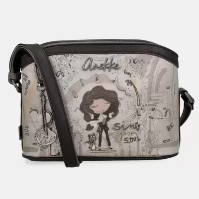 Mala Anekke cinza e preto com ilustração de rapariga e gato e texto decorativo.