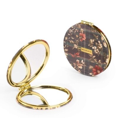 Espelho compacto redondo com moldura dourada e padrão floral