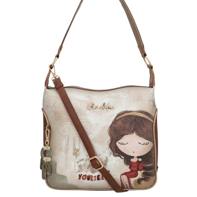 Mala Anekke bege com alça castanha e ilustração de menina com vestido vermelho