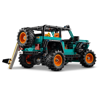 Modelo de Jeep de brinquedo feito de peças de construção em turquesa, preto e laranja com texto Jeep e Surfs UP!