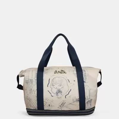 Mala de mão bege com asas pretas largas e desenhos da personagem Anekke