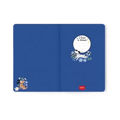Caderno azul com ilustrações de gatos e flores e texto I have a dream