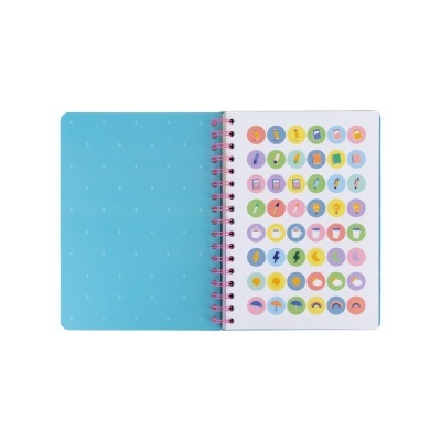 Caderno azul aberto com autocolantes coloridos em círculo