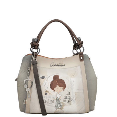 Mala de mão Anekke com ilustração de menina e texto IN LOVE WITH KNOWLEDGE