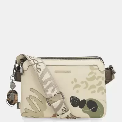 Mala tiracolo Anekke bege clara com padrão abstrato e alça larga com texto.