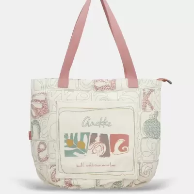 Mala tote bege com desenhos e texto Anekke em bolso frontal