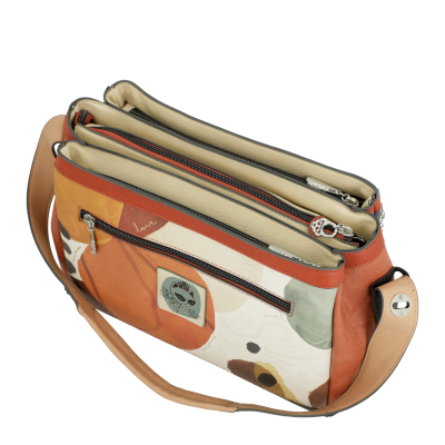 Mala tipo carteira castanha com padrão floral e alça ajustável