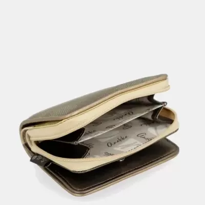 Carteira compacta metálica cobre aberta mostrando interior forrado estampado com nome Anette