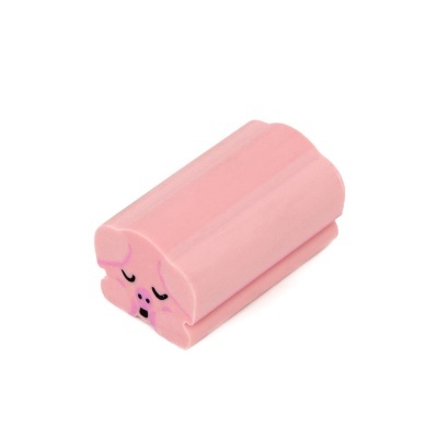 Goma de apagar rosa com rosto desenhado a preto e rosa