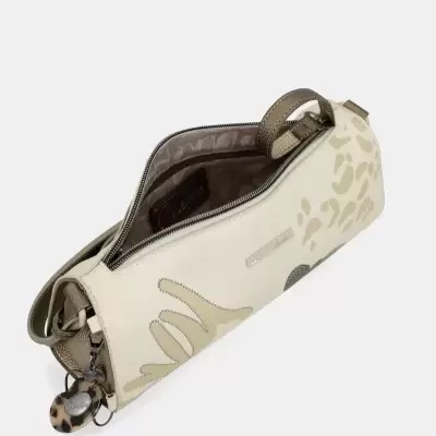 Bolsa creme com padrões abstratos e fecho de correr aberto