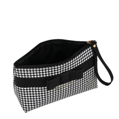 Bolsa carteira preto e branco com padrão pied-de-poule e laço preto