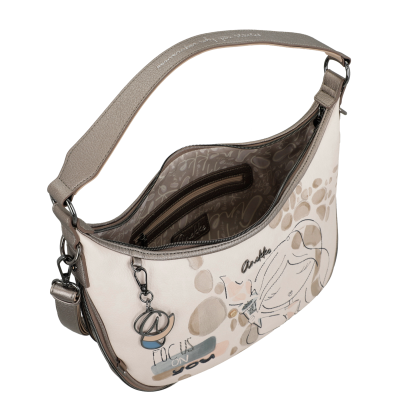 Mala de ombro bege com estampado abstrato e alça castanha larga