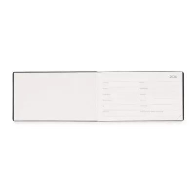 Agenda preta aberta com campos para dados pessoais e o ano 2026