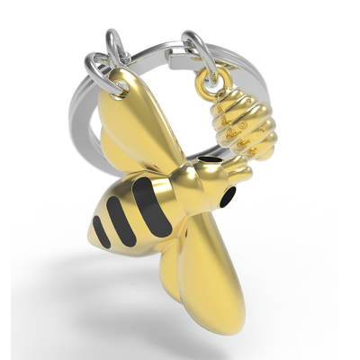 Anel com pendentes em forma de abelha e favo de mel