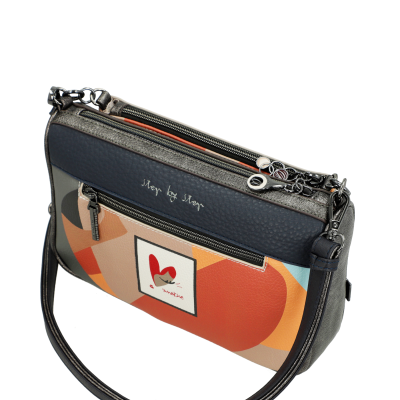 Mala de ombro colorida com padrão geométrico e texto Step by step