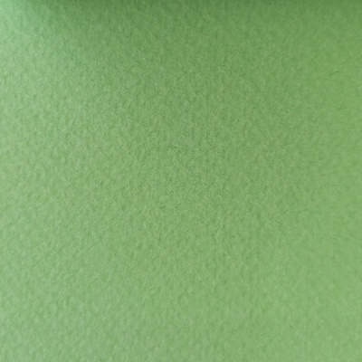 tecido verde claro com textura rugosa