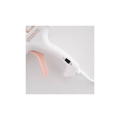 Pistola aplicadora de cola quente branca com gatilho rosa e interruptor preto