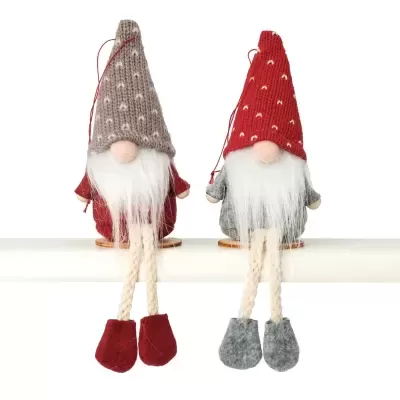 Dois gnomos decorativos de Natal com barbas brancas, chapéus vermelhos e castanhos, roupas vermelhas e botas em feltro.