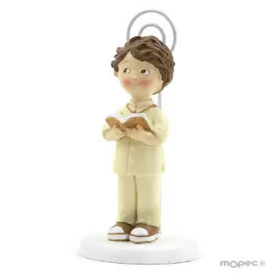 Figura decorativa infantil masculina com pijama bege lendo livro