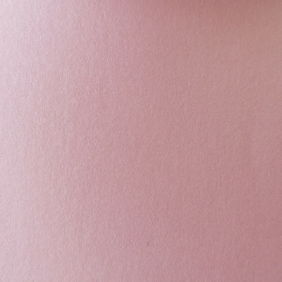 Papel rosa com textura granulada