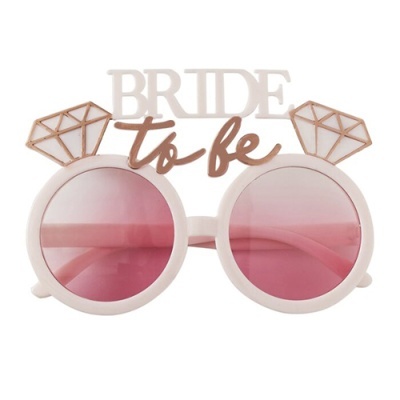 Óculos de sol brancos com lentes rosa e texto decorativo 'BRIDE to be'
