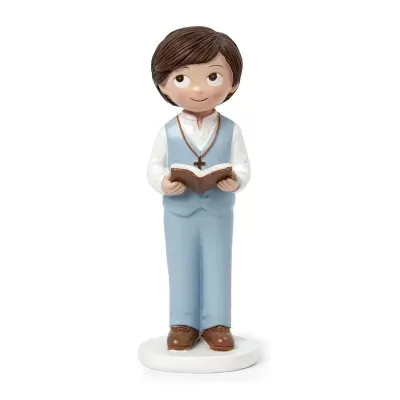 Estatueta de menino em porcelana com livro e colar com cruz