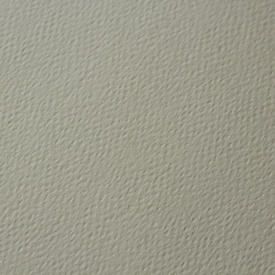 Superfície de pele sintética bege claro com textura granulada