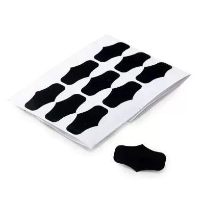 Cartela de 10 autocolantes pretos com formato irregular sobre fundo branco