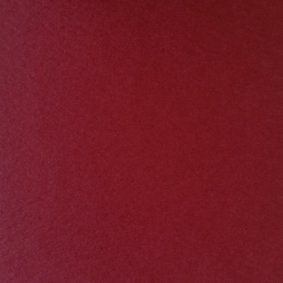 Material vermelho escuro com textura uniforme