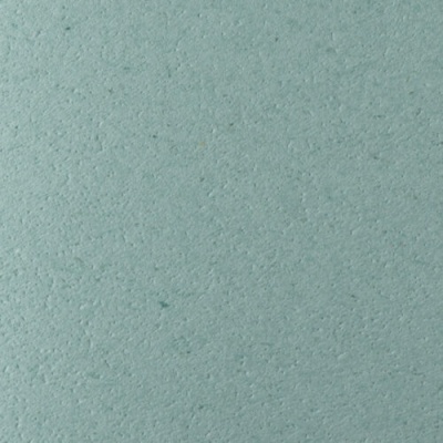 Superfície verde-azulada texturizada.