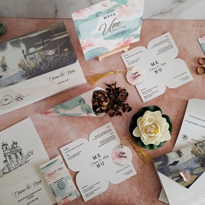 Convites de casamento com design floral e textos com nomes Diana & Nuno e datas 19 de julho 2026