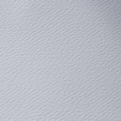 tecido branco acolchoado com padrão ondulado