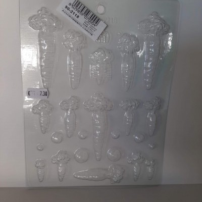 molde transparente de plástico com formatos de cenouras e esferas