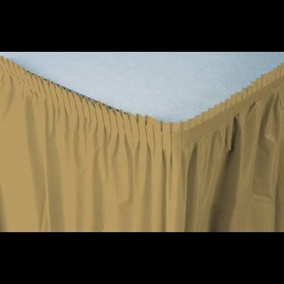 Capa de colchão branco com saia bege que cobre as laterais