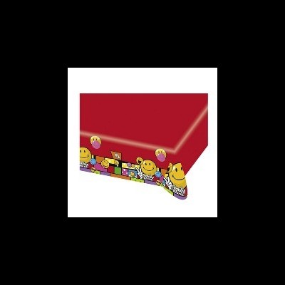 Guardanapo de papel colorido com padrão sorridente sobre superfície vermelha