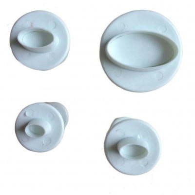Conjunto de quatro tampas circulares brancas com formas ovais no centro