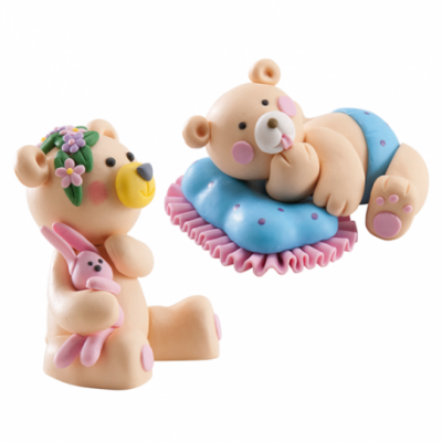 Dois ursos de brinquedo com flores e almofada colorida